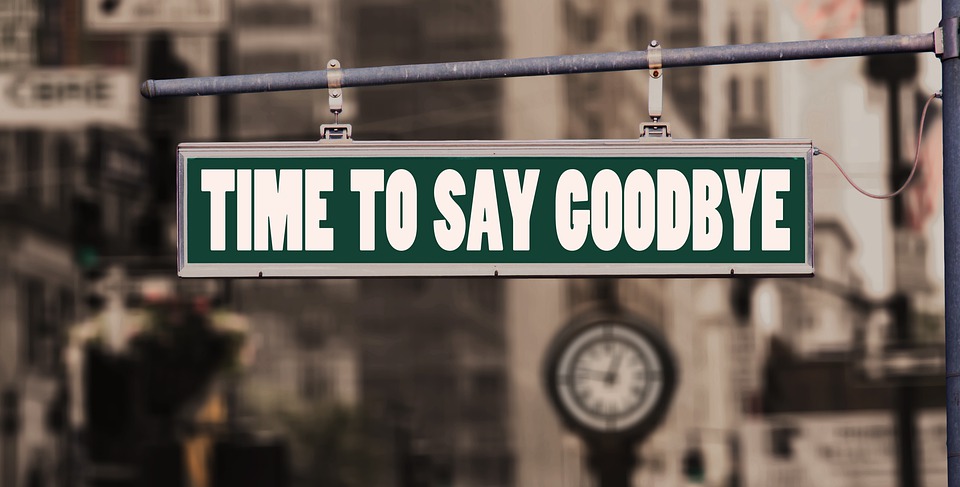 street sign saying time to say goodbye